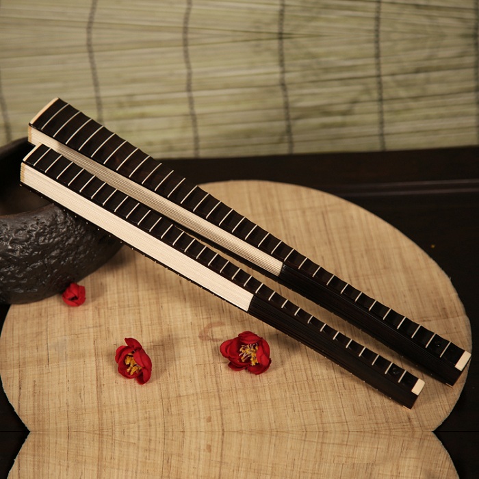 紫光檀鑲牛骨折扇